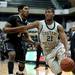 EMU freshman Jalen Ross gets around a Purdue defender in the second half of the game on Saturday. Daniel Brenner I AnnArbor.com